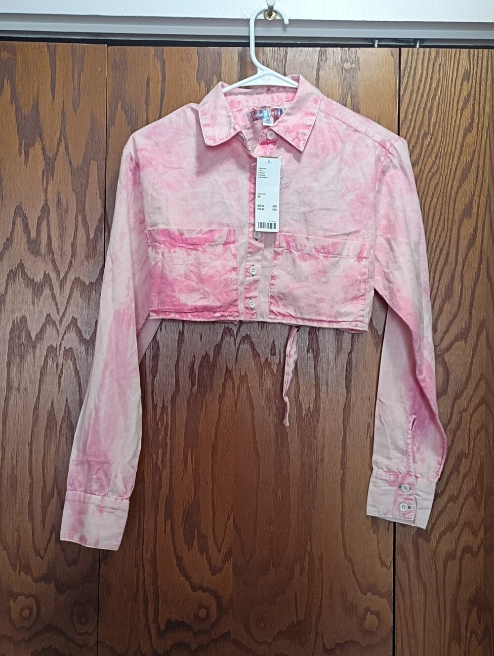 Urban OutfittersCropped Pink Tie-Dye Button-Front Top.